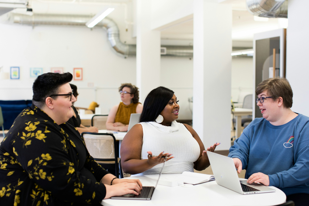 Three gender nonconforming people at a Canada Learning Code workshop