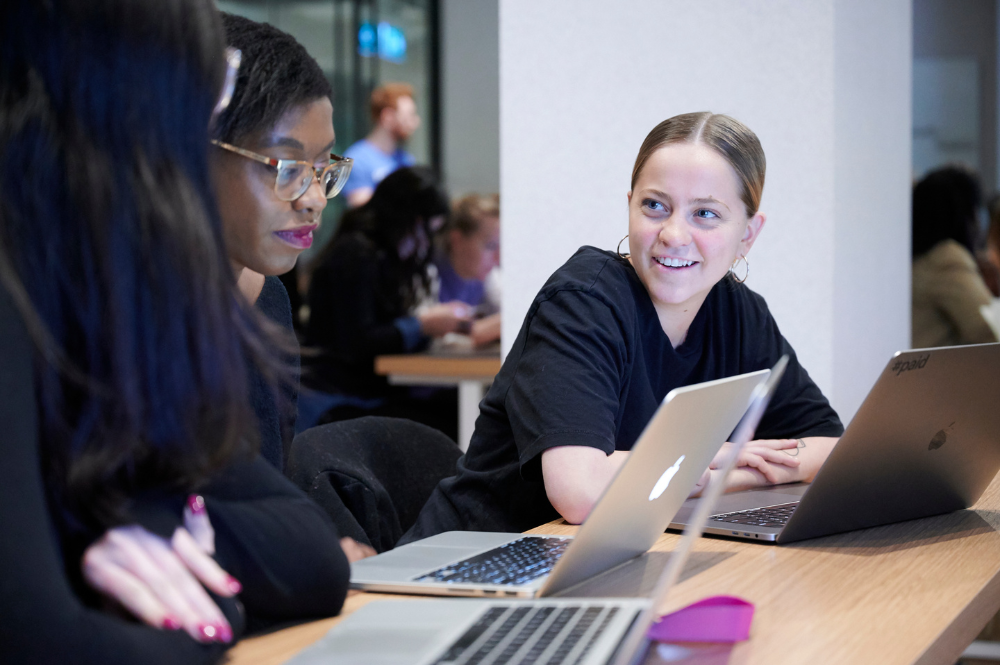 A white woman and a Black woman at a Canada Learning Code workshop