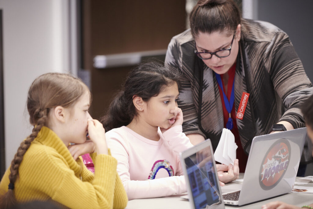 Instructor teaching girls