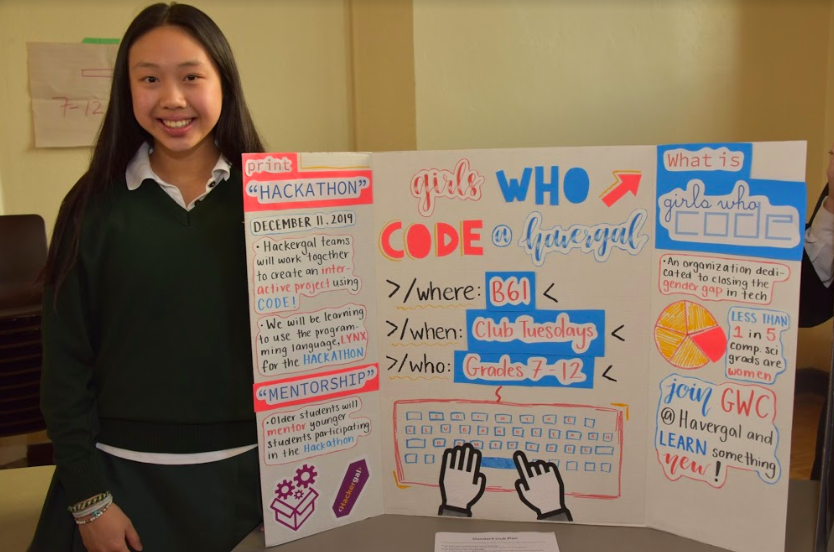 Girl standing in front of presentation board