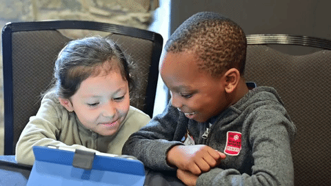 GIF of two kids laughing